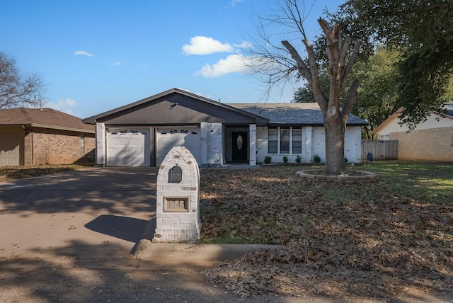 single story home with a garage