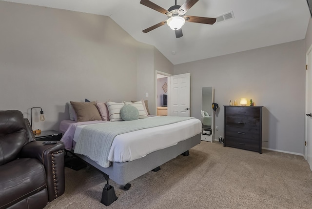 bedroom with ceiling fan, light colored carpet, and lofted ceiling