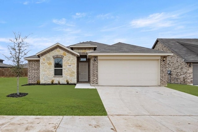 view of front facade featuring a front yard and a garage