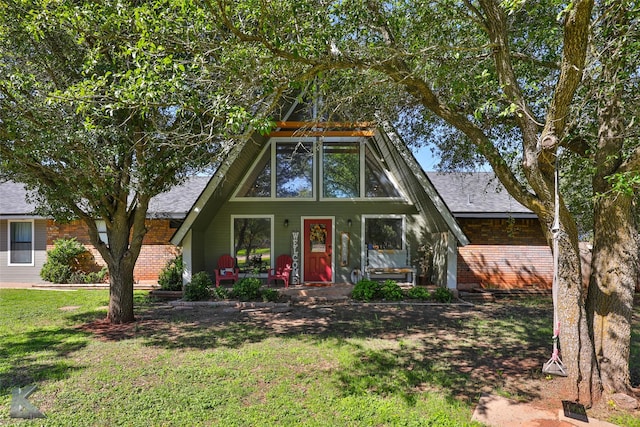 view of front of property with a front lawn