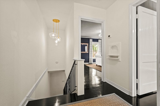 hall featuring dark wood-type flooring