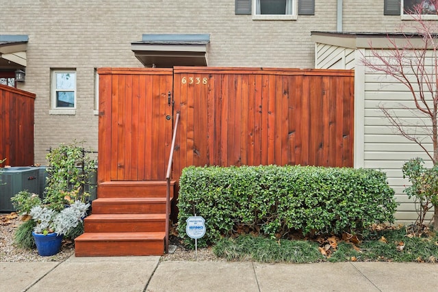 view of gate featuring central AC unit