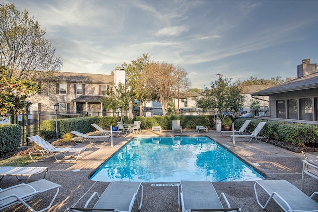 view of swimming pool featuring a patio