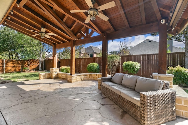 view of patio / terrace featuring ceiling fan, a gazebo, and an outdoor hangout area