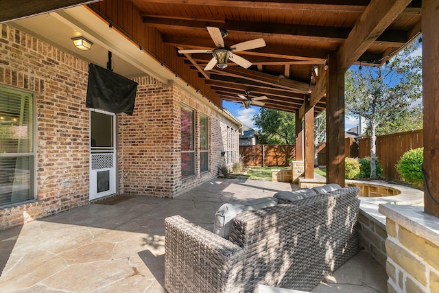 view of patio featuring an outdoor hangout area and ceiling fan