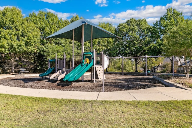 view of jungle gym featuring a yard