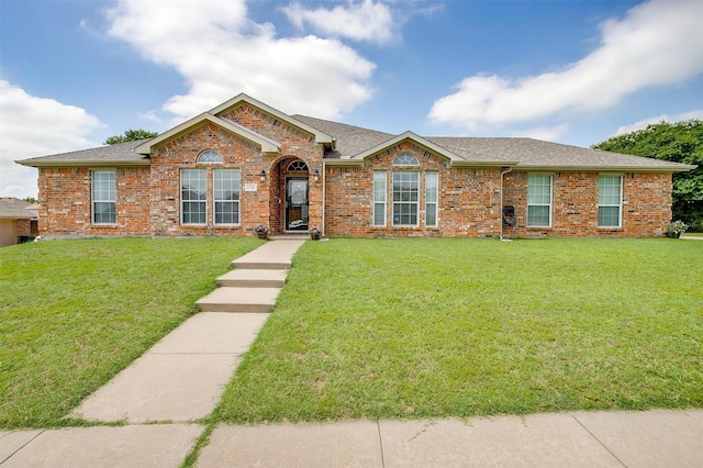 1721 Vista Ridge Dr W, Midlothian, TX 76065 - ranch-style house with a front lawn, a shingled roof, and brick siding