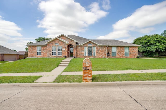 1721 Vista Ridge Dr W, Midlothian, TX 76065 - view of front of house featuring a front yard, brick siding, and a shingled roof