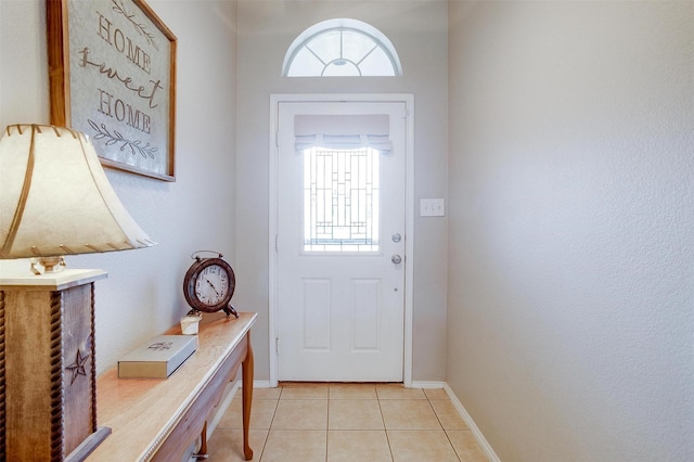 1721 Vista Ridge Dr W, Midlothian, TX 76065 - entryway featuring healthy amount of natural light, light tile patterned flooring, and baseboards