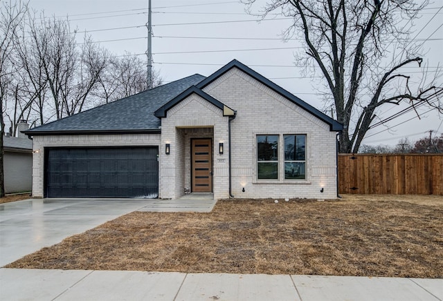 view of front of home with a garage