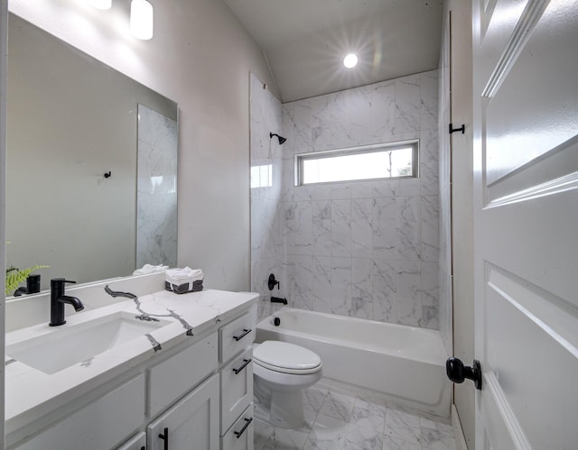 full bathroom with vanity, toilet, and tiled shower / bath combo