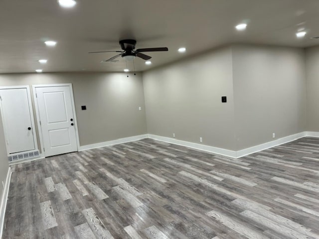 empty room featuring ceiling fan and wood-type flooring