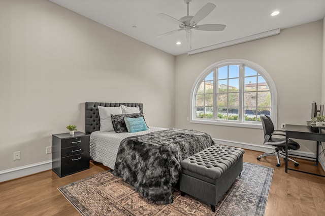 bedroom featuring ceiling fan and wood-type flooring