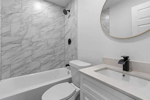 full bathroom featuring vanity, toilet, and tiled shower / bath combo