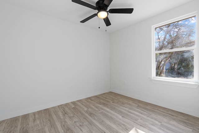 unfurnished room with light wood-type flooring