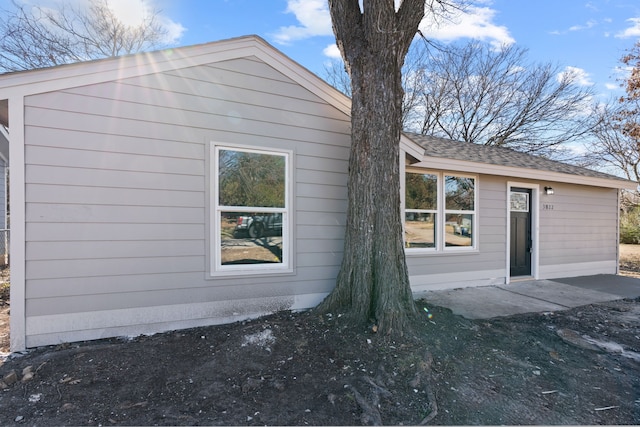 back of property featuring a patio