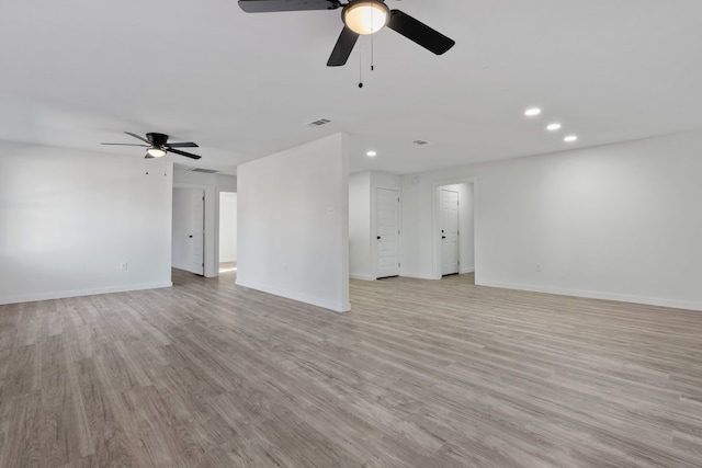 unfurnished living room with light hardwood / wood-style floors and ceiling fan