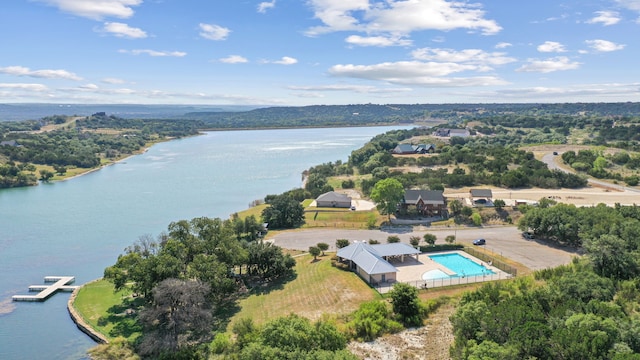 birds eye view of property featuring a water view