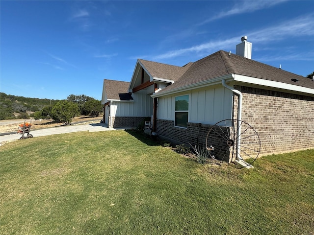 view of property exterior featuring a yard