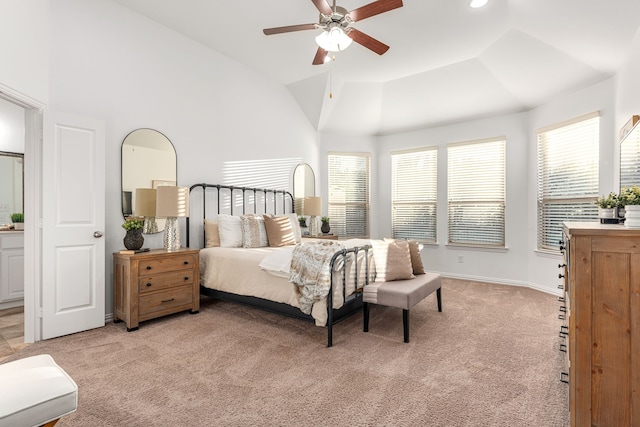 carpeted bedroom with ceiling fan, lofted ceiling, and multiple windows