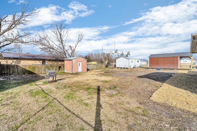 view of yard with a storage shed