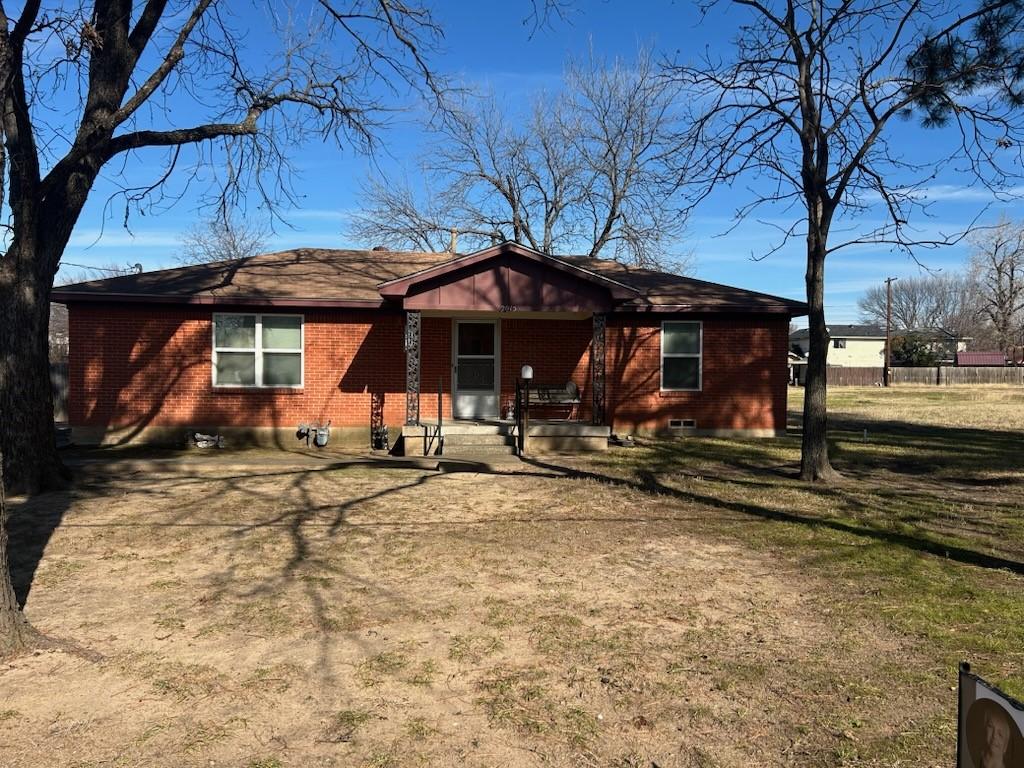 exterior space with a yard