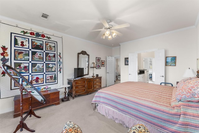 bedroom featuring ceiling fan, carpet, and crown molding