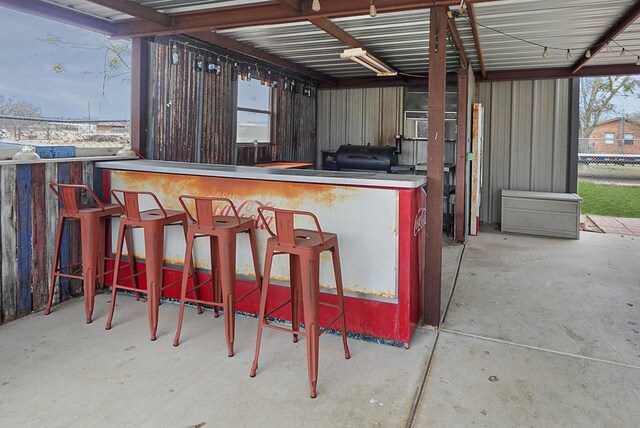 view of patio / terrace with exterior bar