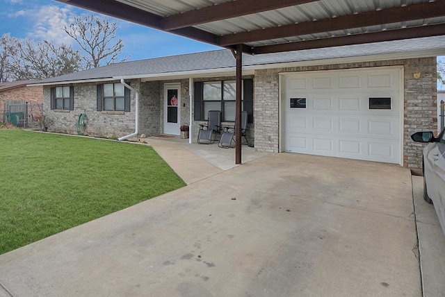 ranch-style home with a front yard and a garage