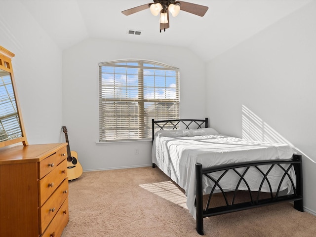 bedroom featuring light carpet, ceiling fan, and lofted ceiling