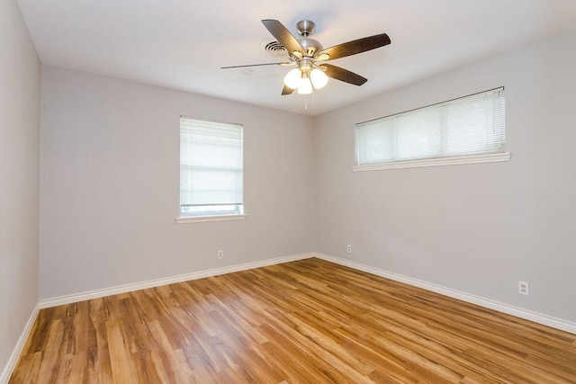 unfurnished room featuring ceiling fan and light hardwood / wood-style flooring