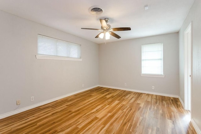 unfurnished room featuring ceiling fan and light hardwood / wood-style floors