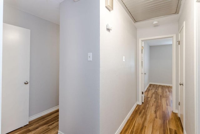 hall with light hardwood / wood-style flooring