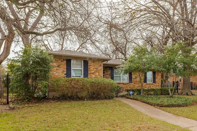 view of front of home with a front yard