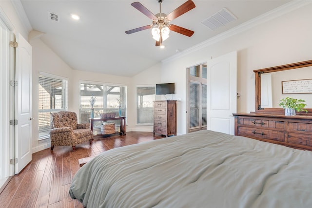 bedroom with ceiling fan, dark hardwood / wood-style flooring, lofted ceiling, and ornamental molding