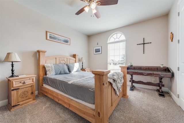 bedroom with ceiling fan and light colored carpet