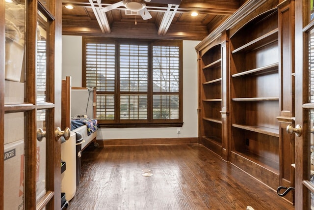 interior space featuring dark hardwood / wood-style flooring, crown molding, beam ceiling, and coffered ceiling