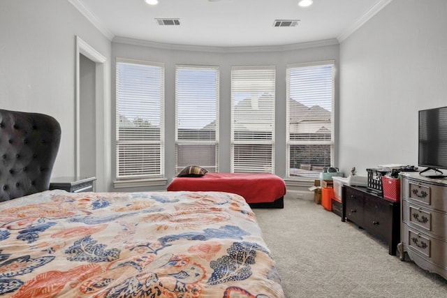 carpeted bedroom with crown molding