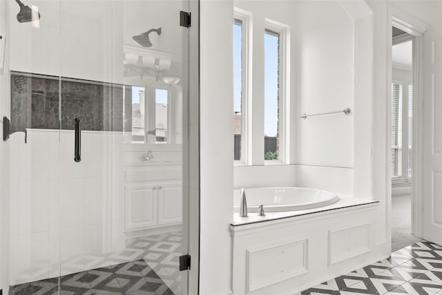 10918 Alta Vista Dr, Frisco, TX 75033 - bathroom featuring a shower stall and a bath