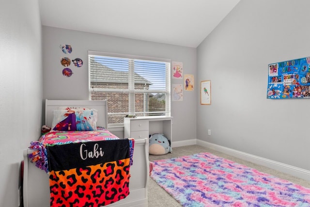 carpeted bedroom featuring vaulted ceiling