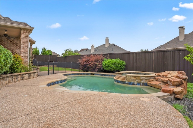 10918 Alta Vista Dr, Frisco, TX 75033 - view of pool featuring a patio area, a pool with connected hot tub, and a fenced backyard