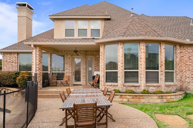 back of property with a patio area