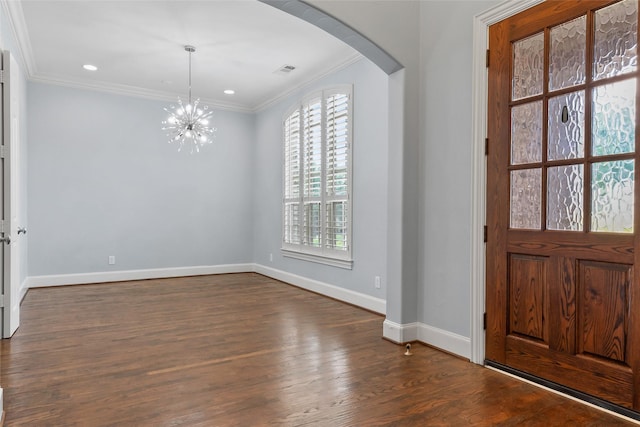 10918 Alta Vista Dr, Frisco, TX 75033 - foyer entrance featuring arched walkways, a wealth of natural light, ornamental molding, and a chandelier