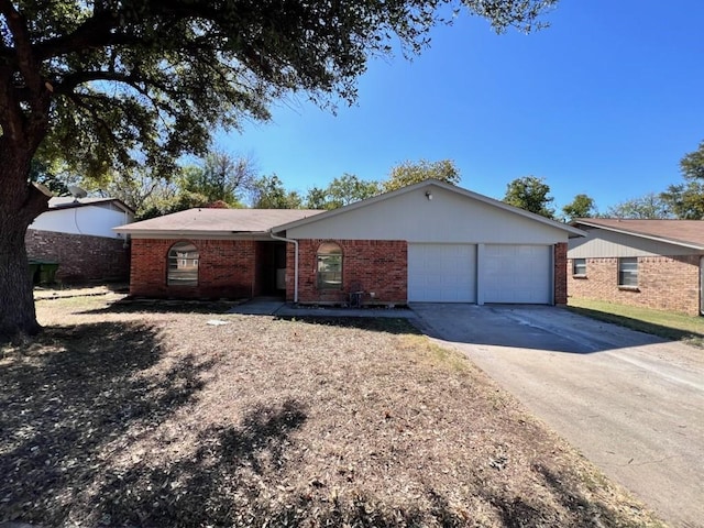 single story home with a garage