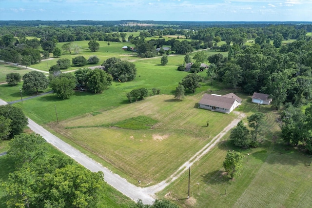 birds eye view of property with a rural view