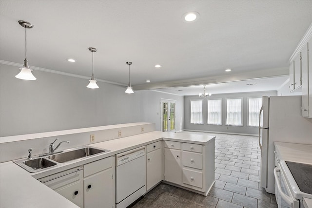 kitchen featuring kitchen peninsula, sink, white appliances, white cabinetry, and hanging light fixtures