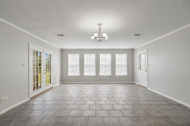 empty room with crown molding, french doors, an inviting chandelier, and a textured ceiling