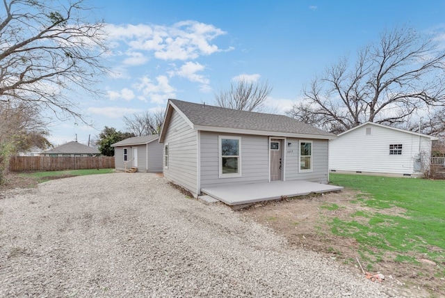 bungalow with a front yard