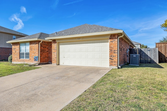 ranch-style home featuring central AC unit, a front lawn, and a garage