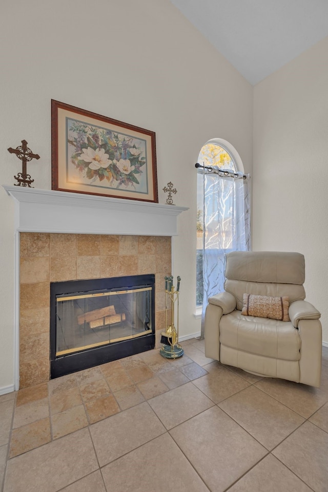 tiled living room featuring a fireplace